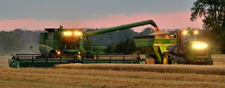 Farming photo with combine and tractor